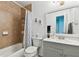 Bathroom featuring a tiled shower/tub, a toilet, and a vanity with sink at 4353 Shadow Crest Pl # 3, Orlando, FL 32811