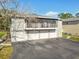 Charming condo featuring a screened balcony and three-car garage, perfect for comfortable living and ample parking at 4353 Shadow Crest Pl # 3, Orlando, FL 32811
