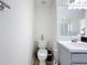 Functional bathroom with toilet and vanity at 458 Hollinghead Loop, Davenport, FL 33896