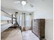 Bedroom featuring a bunk bed, large window, ceiling fan, and a dresser at 458 Hollinghead Loop, Davenport, FL 33896
