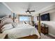 Bedroom with four-poster bed, and access to a balcony overlooking an ocean view at 4651 S Atlantic Ave # 2030, Ponce Inlet, FL 32127