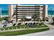 An inviting exterior shot of a beachfront condo with well-maintained landscaping and convenient parking at 4651 S Atlantic Ave # 2030, Ponce Inlet, FL 32127