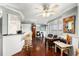 Bright living room featuring hardwood floors, custom window shutters and cozy seating at 4651 S Atlantic Ave # 2030, Ponce Inlet, FL 32127