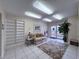 Welcoming lobby with tile floor, large rug, comfortable sofa, and view to the outside at 4651 S Atlantic Ave # 2030, Ponce Inlet, FL 32127