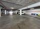 Well-lit parking garage with marked spaces and ample room for vehicles at 4651 S Atlantic Ave # 2030, Ponce Inlet, FL 32127