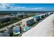 Aerial view of the condo building, beach, and surrounding neighborhood at 4651 S Atlantic Ave # 2030, Ponce Inlet, FL 32127