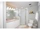 This full bathroom features a glass enclosed shower and nice vanity at 4651 S Atlantic Ave # 2030, Ponce Inlet, FL 32127