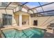 Private pool area with a patio, offering a relaxing outdoor space with clear blue water at 4841 Romeo Cir, Kissimmee, FL 34746