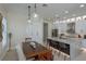 Open concept with a view of a dining room and kitchen area at 528 Lobelia Dr, Lake Mary, FL 32746