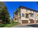 Townhome showcasing a two-car garage and private balcony at 528 Lobelia Dr, Lake Mary, FL 32746