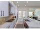 Sleek kitchen with marble countertops, stainless steel appliances, and a stylish design at 528 Lobelia Dr, Lake Mary, FL 32746