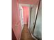 Bathroom featuring a shower and doorway leading to another room or closet space at 536 Dunoon St, Ocoee, FL 34761