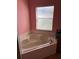 Close-up of a bathtub with a window view, perfect for relaxation and comfort at 536 Dunoon St, Ocoee, FL 34761