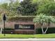 Elegant brick community sign for Wesmere, surrounded by lush landscaping and mature trees at 536 Dunoon St, Ocoee, FL 34761