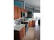 Well-equipped kitchen with stainless appliances, quartz counters, and stylish cabinetry at 536 Dunoon St, Ocoee, FL 34761