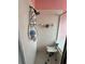 Tiled shower featuring a handheld shower head and a built-in seat at 536 Dunoon St, Ocoee, FL 34761