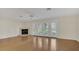 Spacious living room with fireplace and French doors at 5569 Jessamine Ln, Orlando, FL 32839