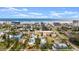 Aerial view of this coastal home's prime location near the ocean and local buildings at 7 Clarendon Ct, Daytona Beach, FL 32118