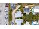 Aerial view showing the layout of the neighborhood including a home with a grey roof near the parking area at 7 Clarendon Ct, Daytona Beach, FL 32118