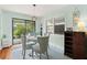 Elegant dining room with sliding doors to the outside and ample natural light at 7 Clarendon Ct, Daytona Beach, FL 32118