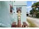 A unique Tiki statue detail adds a touch of character to the exterior of this property at 7 Clarendon Ct, Daytona Beach, FL 32118