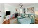Bright living room with a fireplace, comfortable seating, and stylish decor at 7 Clarendon Ct, Daytona Beach, FL 32118