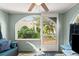 Inviting porch area featuring an archway and view of the lush greenery outside at 7 Clarendon Ct, Daytona Beach, FL 32118