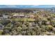 Stunning aerial view of the property surrounded by mature trees in a vibrant neighborhood near downtown at 718 E Livingston St, Orlando, FL 32803