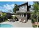 Exterior backyard view with a pool and outdoor seating area at 718 E Livingston St, Orlando, FL 32803