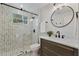 Beautiful bathroom with a glass shower, patterned tile, and a modern vanity at 718 E Livingston St, Orlando, FL 32803