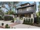 Charming two-story home with landscaped yard and a welcoming front porch at 718 E Livingston St, Orlando, FL 32803
