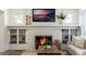 Stylish living room fireplace with a white brick surround and decorative mantle at 718 E Livingston St, Orlando, FL 32803