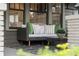 Close up of the front porch with comfortable seating and decor at 718 E Livingston St, Orlando, FL 32803