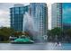 Beautiful view of Lake Eola Fountain with high-rise buildings in the background at 718 E Livingston St, Orlando, FL 32803