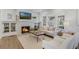 Bright and airy living room with a fireplace and large windows at 718 E Livingston St, Orlando, FL 32803