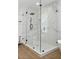 Elegant glass shower featuring stylish tile and a modern showerhead at 718 E Livingston St, Orlando, FL 32803