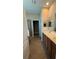 Primary bathroom with double vanity and glass shower at 7525 Colbury Ave, Windermere, FL 34786