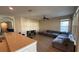 View of the open concept living area, featuring hardwood floors and neutral wall colors at 7525 Colbury Ave, Windermere, FL 34786