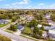 Charming home with a well-maintained lawn, fenced yard, and city views in the distance at 864 Naples Dr, Orlando, FL 32804