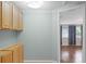 Hallway area featuring cabinets and hardwood flooring at 864 Naples Dr, Orlando, FL 32804
