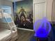 Fun bedroom with bunk beds and vibrant Marvel Avengers wall decor at 8914 Caroline Bay Ct, Kissimmee, FL 34747