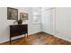 Cozy bedroom featuring wooden floors, a window, and a closet at 892 Cool Springs Cir, Ocoee, FL 34761