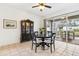 Bright dining area with sliding glass doors leading to an outdoor patio at 892 Cool Springs Cir, Ocoee, FL 34761