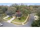 A well-maintained home features a verdant lawn and professional landscaping at 892 Cool Springs Cir, Ocoee, FL 34761