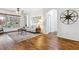 Bright living room with hardwood floors, a ceiling fan, and comfortable seating at 892 Cool Springs Cir, Ocoee, FL 34761