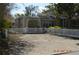 Beautiful home featuring a front yard with a white picket fence and driveway, complete with a covered porch at 933 Lakehurst St, Lakeland, FL 33805