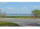 Picturesque view of the lake with serene waters and a beautiful horizon under a sunny sky at 933 Lakehurst St, Lakeland, FL 33805