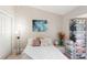 Cozy bedroom features neutral decor and a serene atmosphere at 1075 Kensington Park Dr # 203, Altamonte Springs, FL 32714