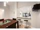 Dining area features bar seating looking into kitchen with black bar stools at 1075 Kensington Park Dr # 203, Altamonte Springs, FL 32714