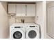 Laundry area features modern Whirlpool washer and dryer set at 1075 Kensington Park Dr # 203, Altamonte Springs, FL 32714